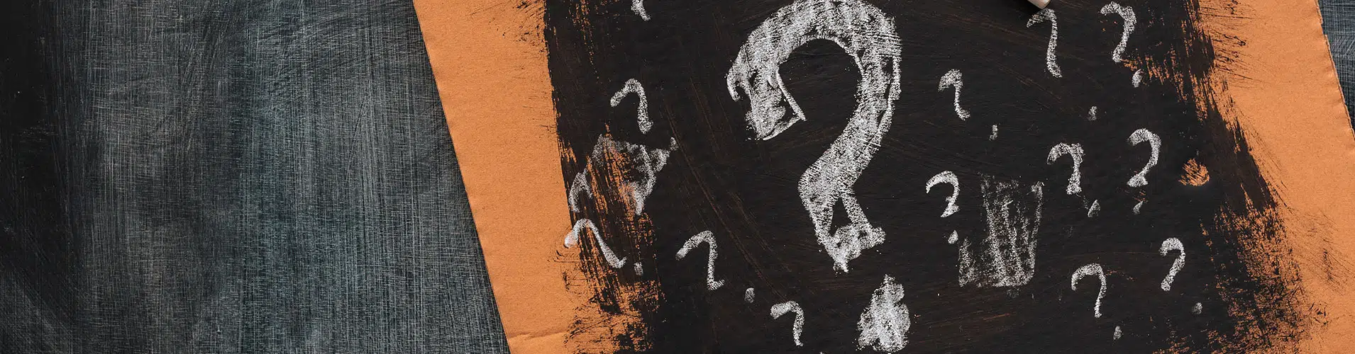 Question marks drawn cardboard